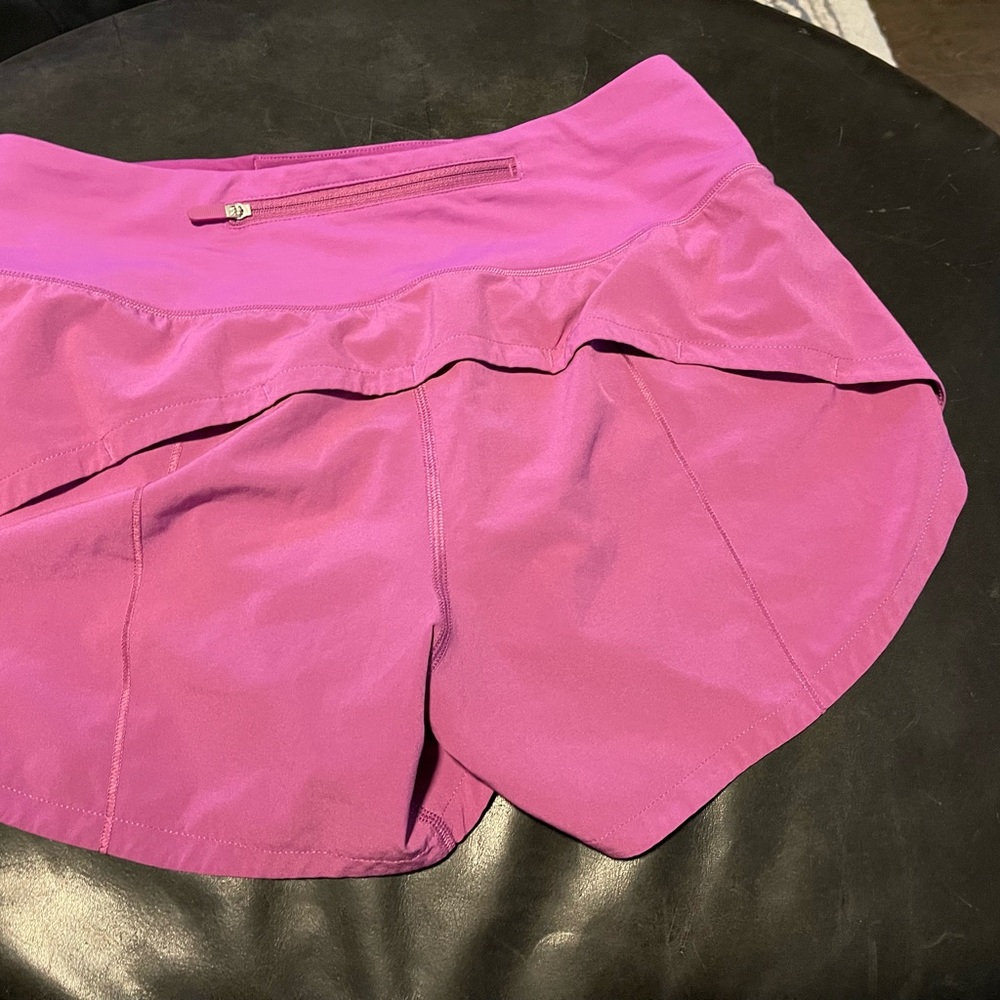 Lululemon Speed Up light purple 4 inch length